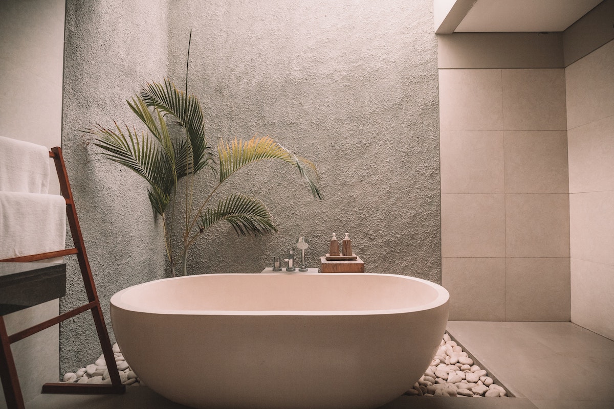 4 Useful Tips on How to Create a Sustainable Bathroom. Photographed by Jared Rice. Image via Unsplash