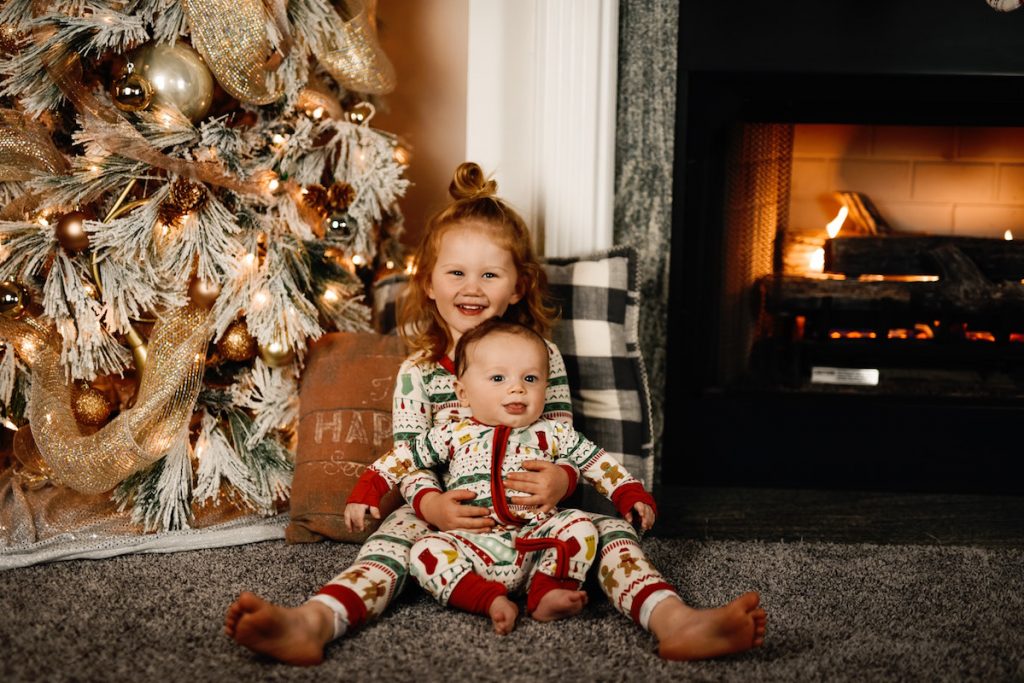 Children at Christmas. Image by Christian Bowen via Unsplash.