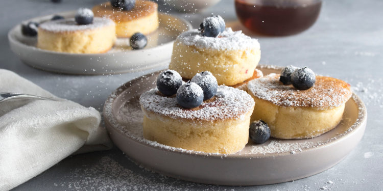 Fluffy Japanese Style Soufflé Pancakes Recipe. Photographed by Larisa Klassen. Image via Shutterstock.