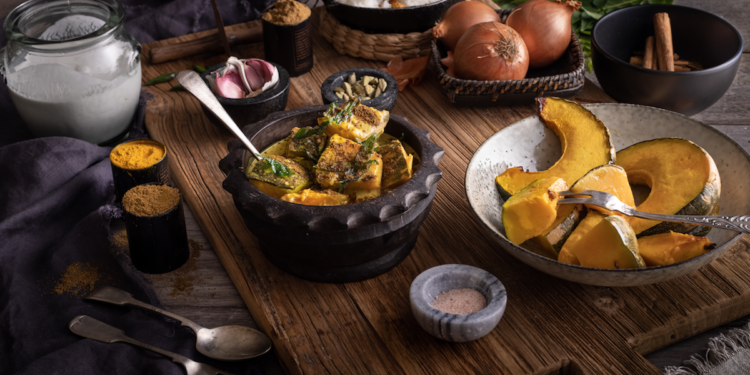 Peter Kuruvita Vegan One-Pot Sri Lankan Pumpkin, Coconut and Mustard Curry Recipe. Image supplied.