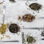 Tea selections on teaspoons. Photographed by Alice Pasqual. Image via Unsplash