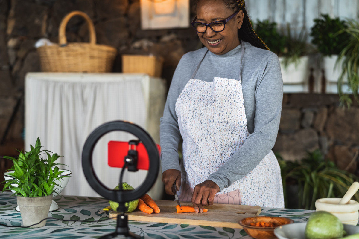 Woman hosting virtual masterclass. Photographed by Alessandro Biascioli. Image via Shutterstock