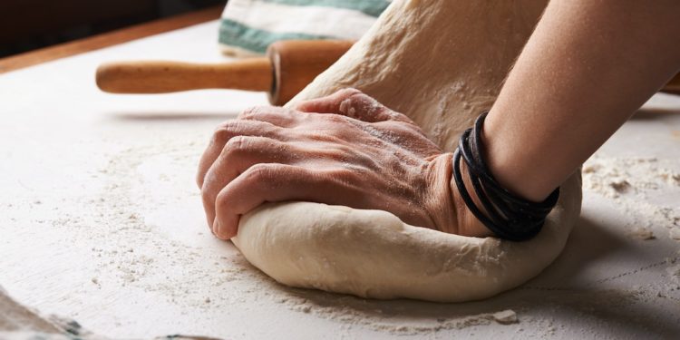 Sydney's Cucina Porto Homemade Authentic Italian Pizza Dough Recipe. Photographed by Nadya Spetnitskaya. Image via Unsplash
