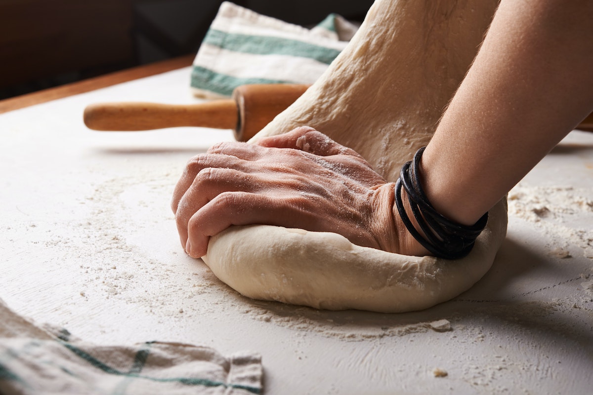 Sydney's Cucina Porto Homemade Authentic Italian Pizza Dough Recipe. Photographed by Nadya Spetnitskaya. Image via Unsplash