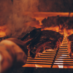 Top 8 Barbecue Tips and Tricks From a BBQ Pitmaster. Photographed by Emerson Vieira. Image via Unsplash.