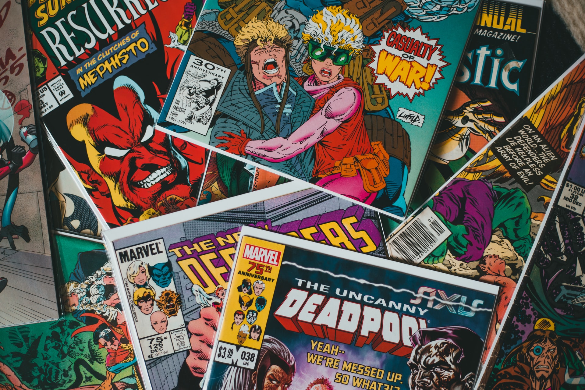 Comics and Graphic Novels arranged. Photography by Erik Mclean. Image via Unsplash