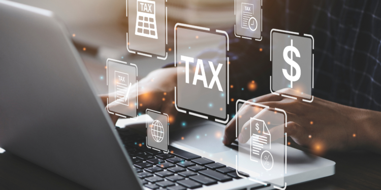 How Aussies Can Claim Working From Home Expenses on their Tax Return. Photographed by Deemerwha studio. Image via Shutterstock.