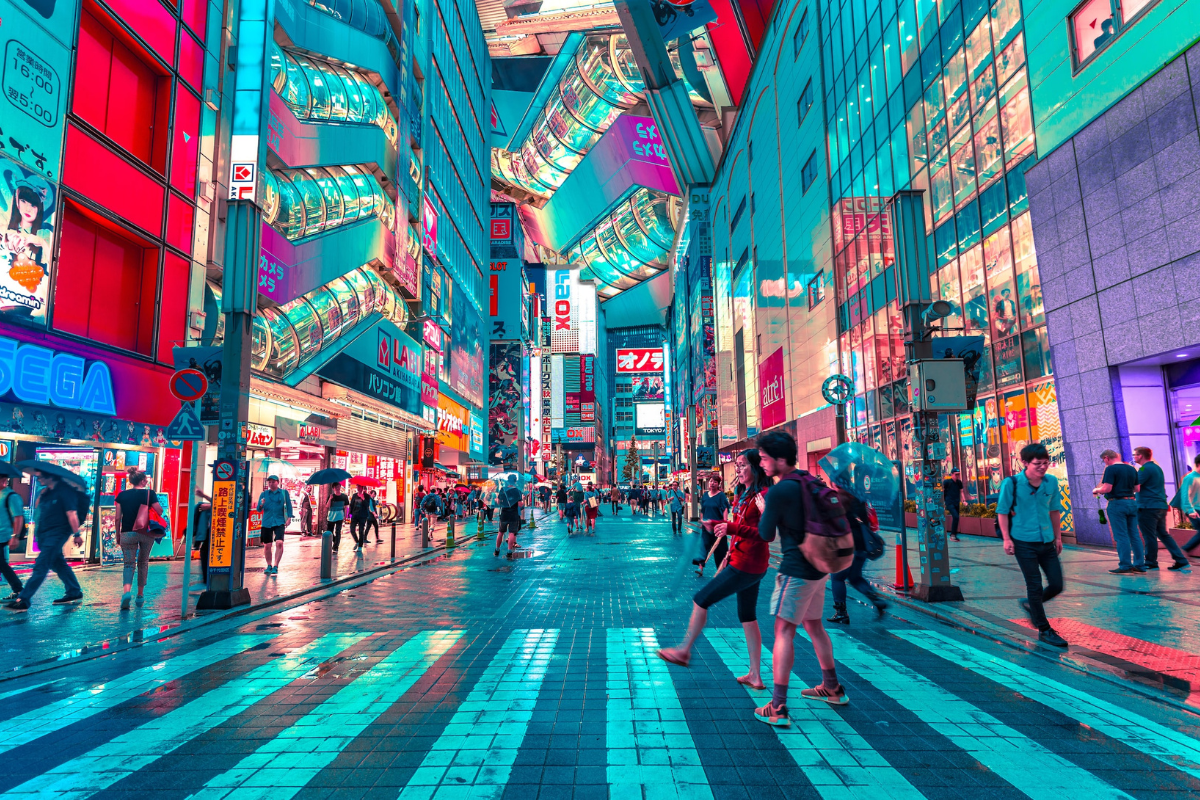 People walking at night in Tokyo. Photography by Jezael Melgoza. Image via Unsplash