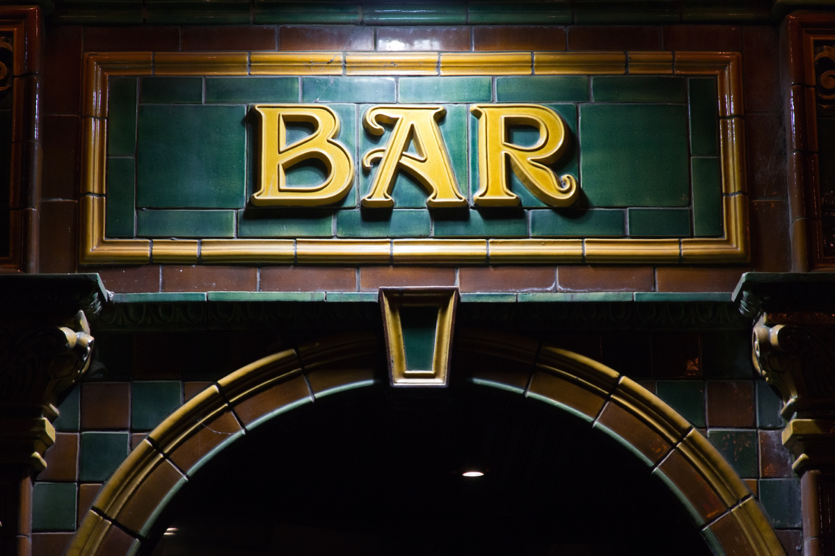 Bar sign. Photography by VanderWolf Images. Image via Shutterstock