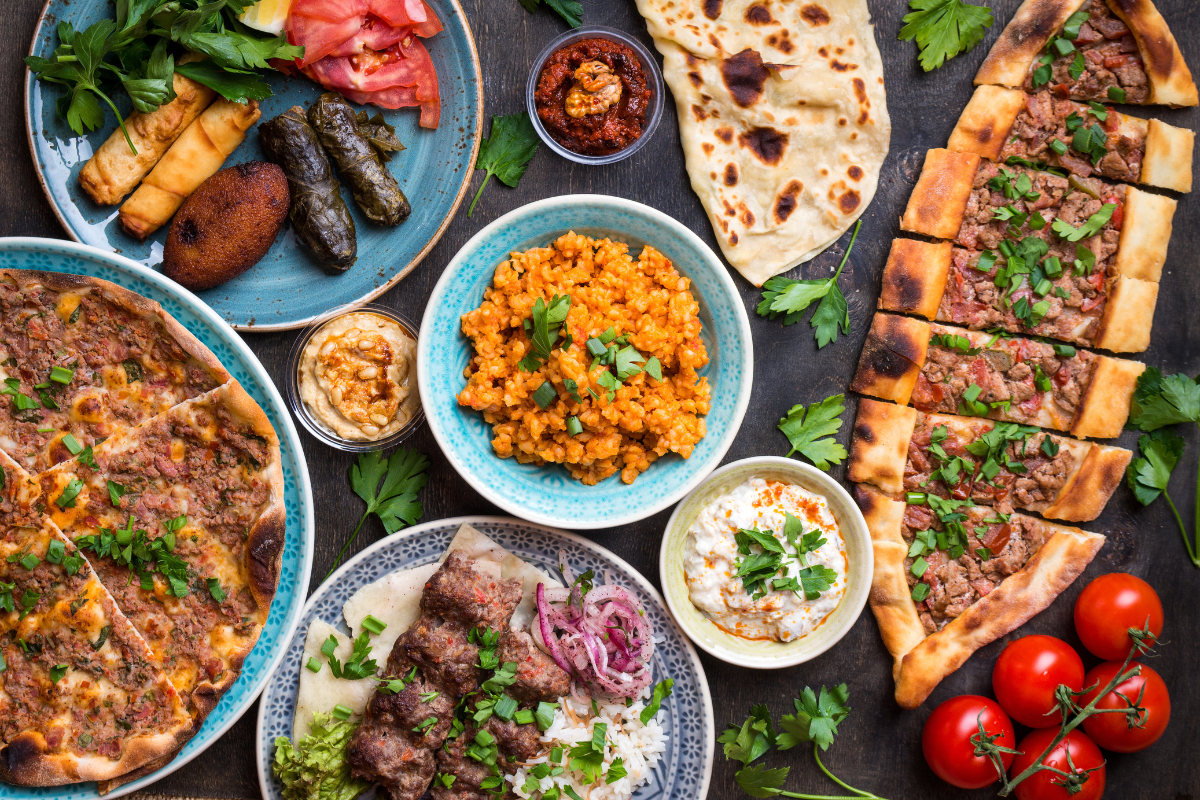 Middle Eastern Cooking on table. Photography by Elena Eryomenko. Image via Shutterstock