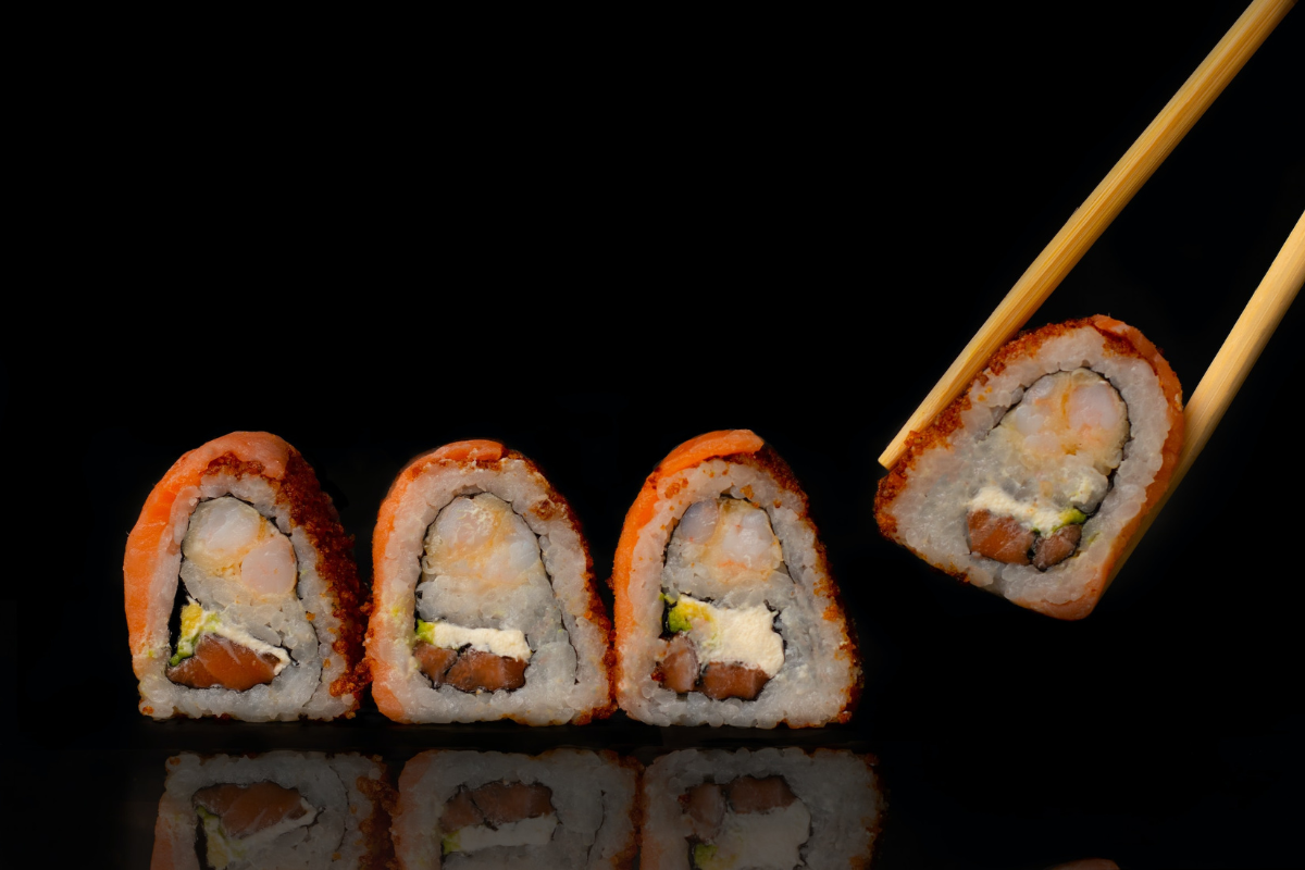 Sushi picked up. Photography by Mahmoud Fawzy. Image via Unsplash