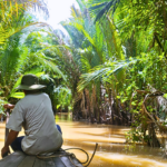 Canoe ride through Mekong Delta. Photography by Dino Vlachos