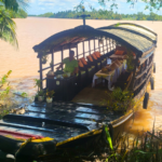 Mango Cruise boat on Mekong River. Photography by Dino Vlachos