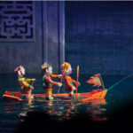 Traditional Vietnamese Water Puppet Show. Photography by Danny Iacob. Image via Shutterstock