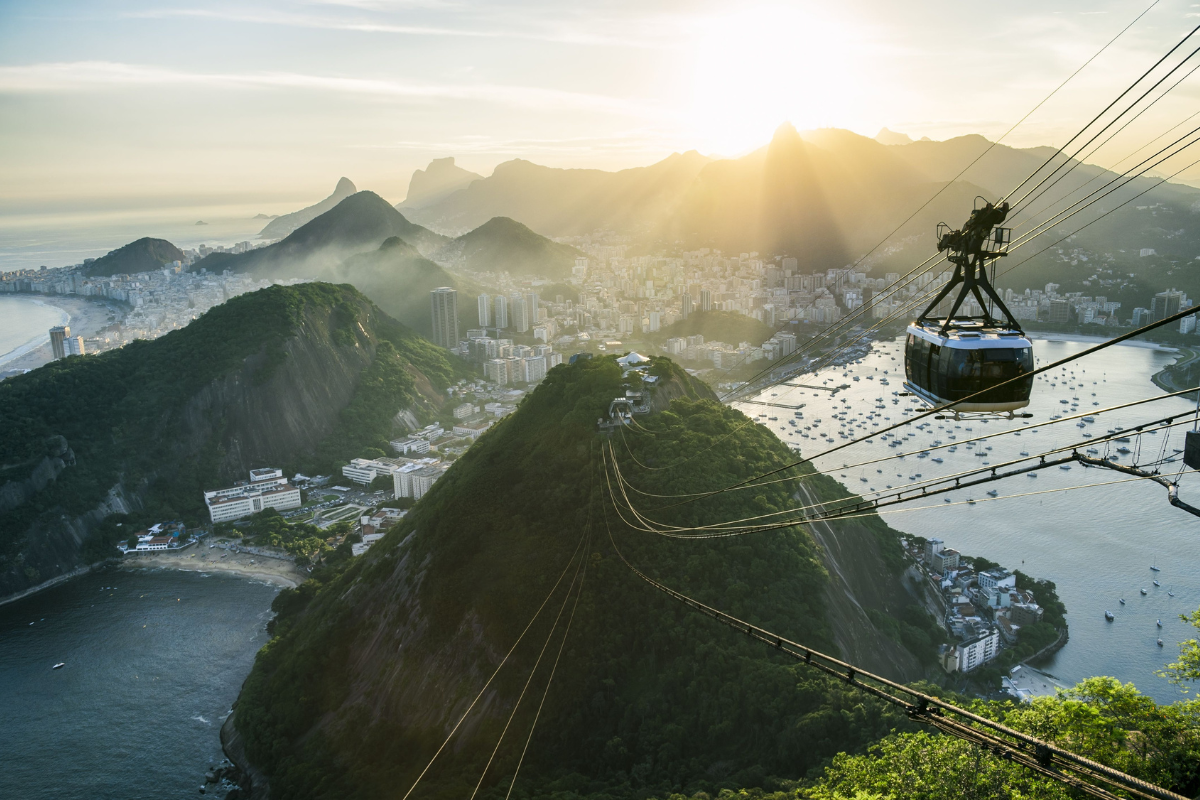 Bright misty view of the city skyline of Rio de Janeiro. Photography by lazyllama. Image via Shutterstock