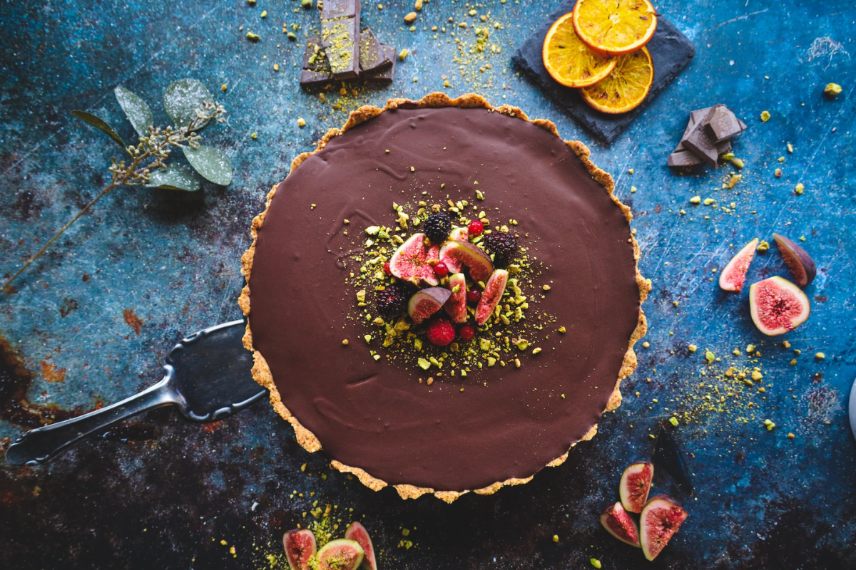 Cake on table. Photography by Ruth Georgiev. Image via Unsplash