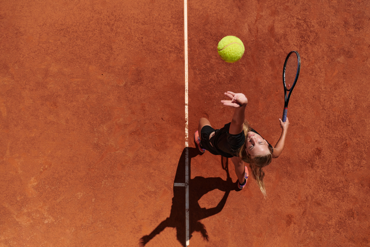 Top view of professional female tennis player. Photography by dotshock. Image via Shutterstock