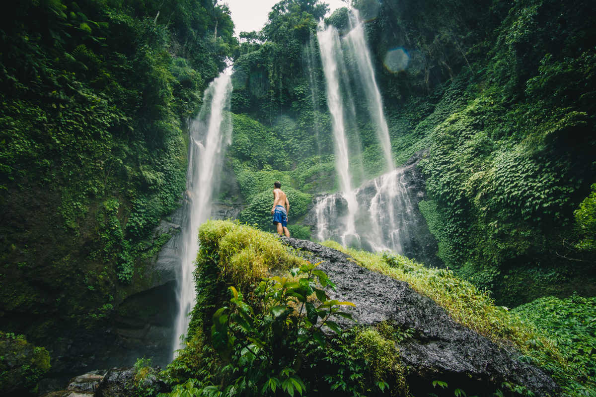 5 Solo Travel Destinations in the World to Visit in 2024. Sekumpul Waterfall, Bali. Photographed by kasakphoto. Image via Shutterstock.