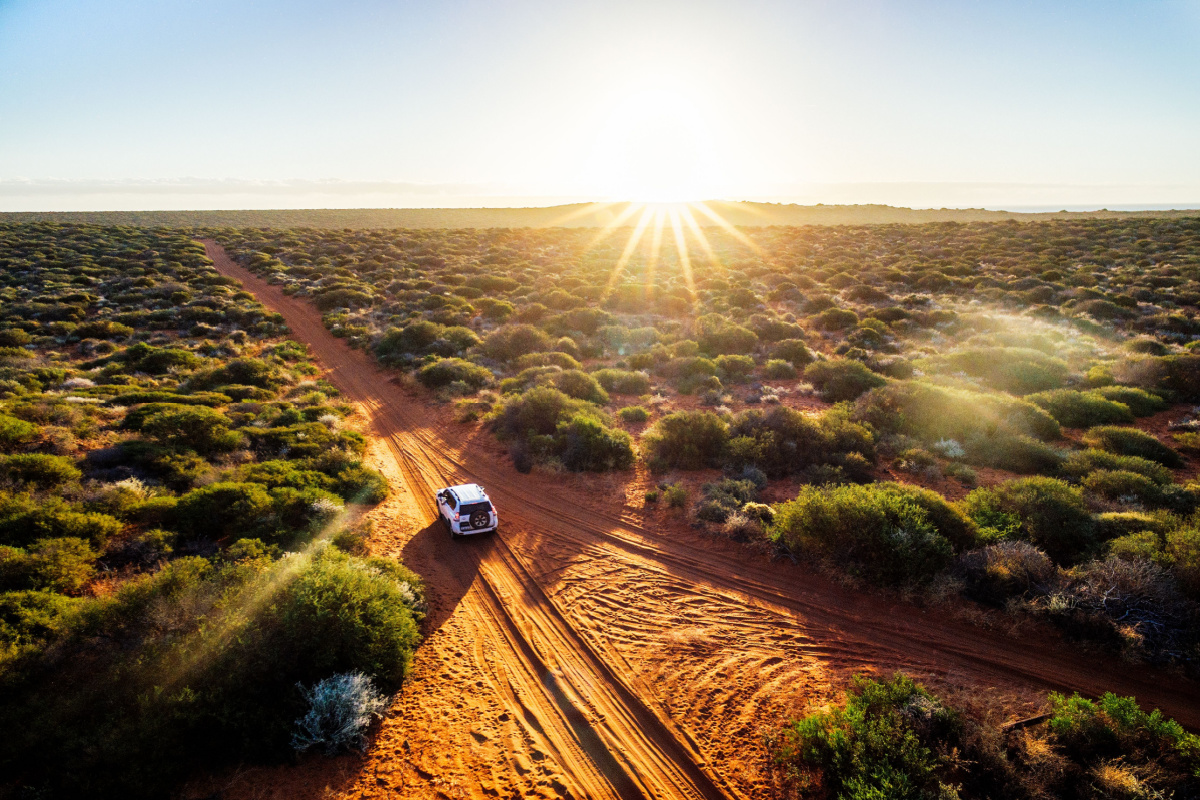 Ute travelling through Australian outback. Photography by iacomino FRiMAGES. Image via Shutterstock
