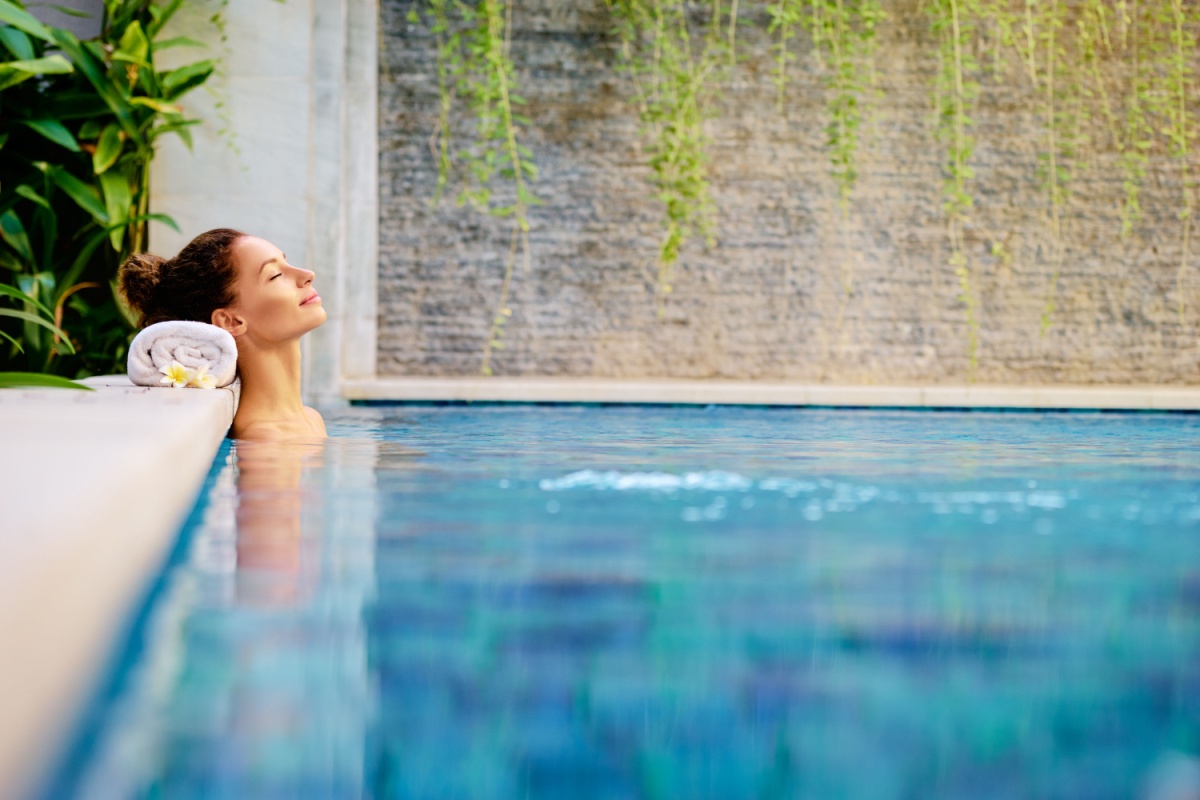 Woman lying in a spa. Photography by kudla. Image via Shutterstock