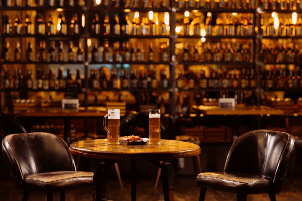 Evening at a pub. Photography by VHarasymiv. Image via Shutterstock