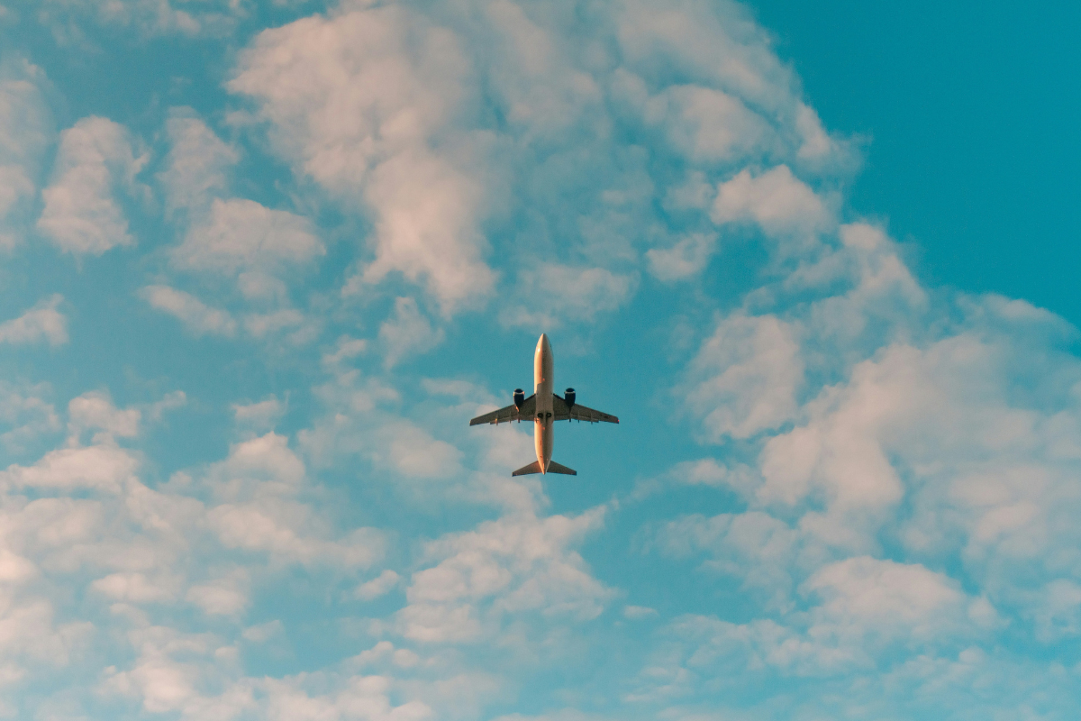 8 Helpful Travel Tips for Surviving Long Haul Flights. Photographed by Philip Myrtorp. Image via Unsplash.