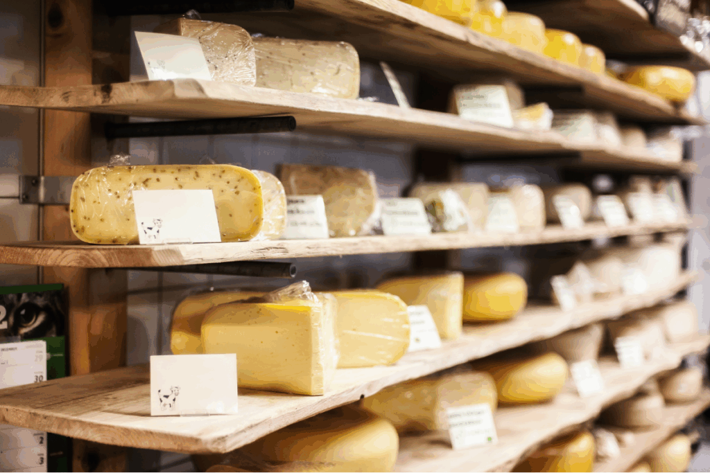 Traditional cheese in store. Photograhpy by guruXOX via Shutterstock