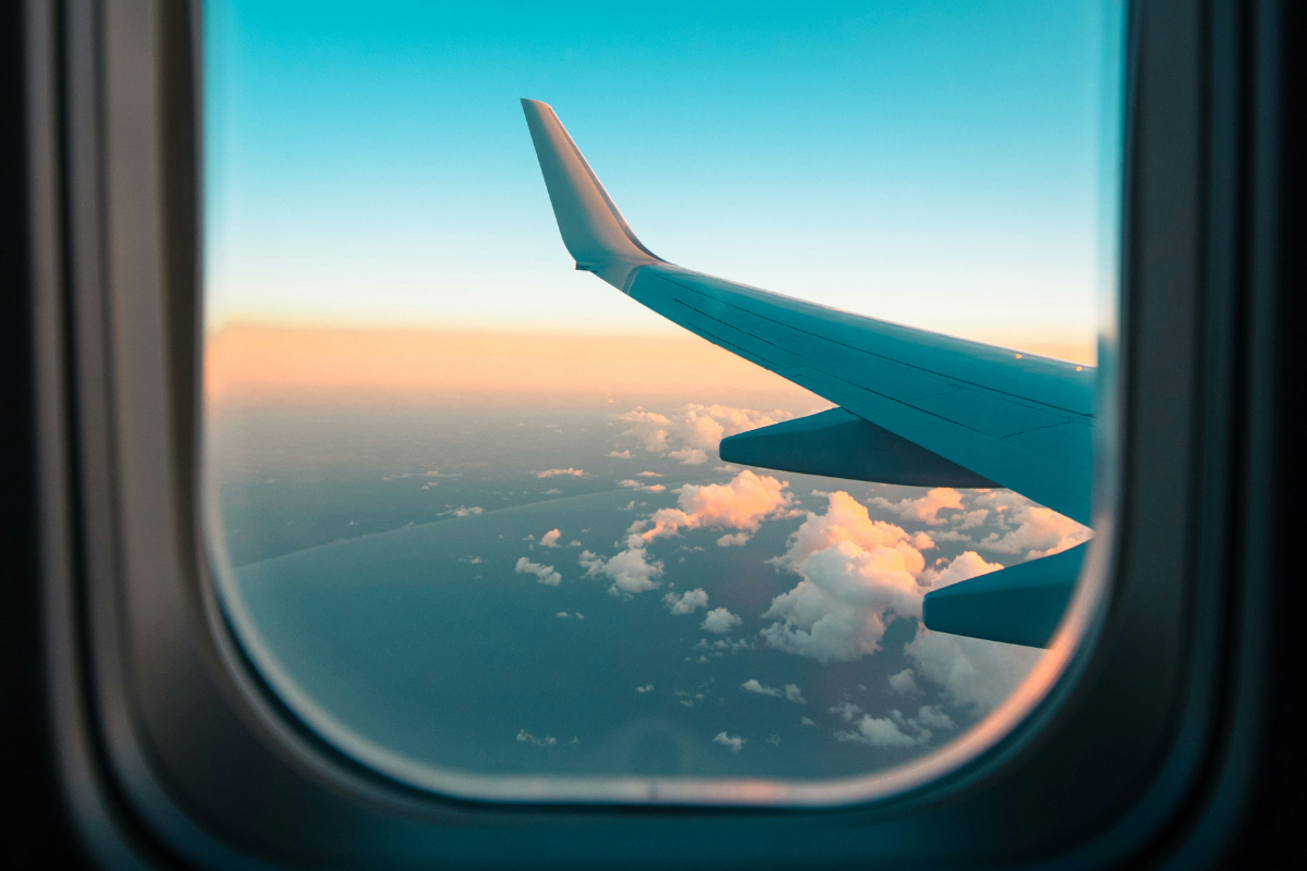 7 Must Have Travel Accessories For Your Next Holiday. Photographed by Jack Cohen. Image via Unsplash.