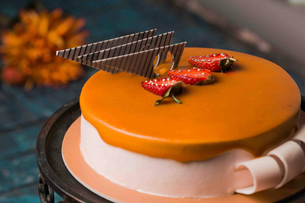 Cake on display. Photography by SwapnIl Dwivedi. Image via Unsplash