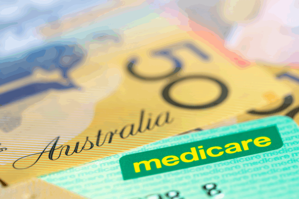 Australian Medicare card and currency. Photography by Robyn Mackenzie via Shutterstock