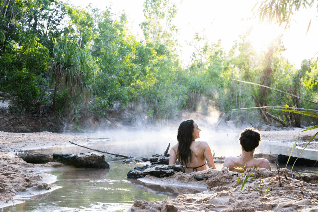 Relaxing at the Douglas Hot Springs. Photography by Nathan McNeil via Tourism NT