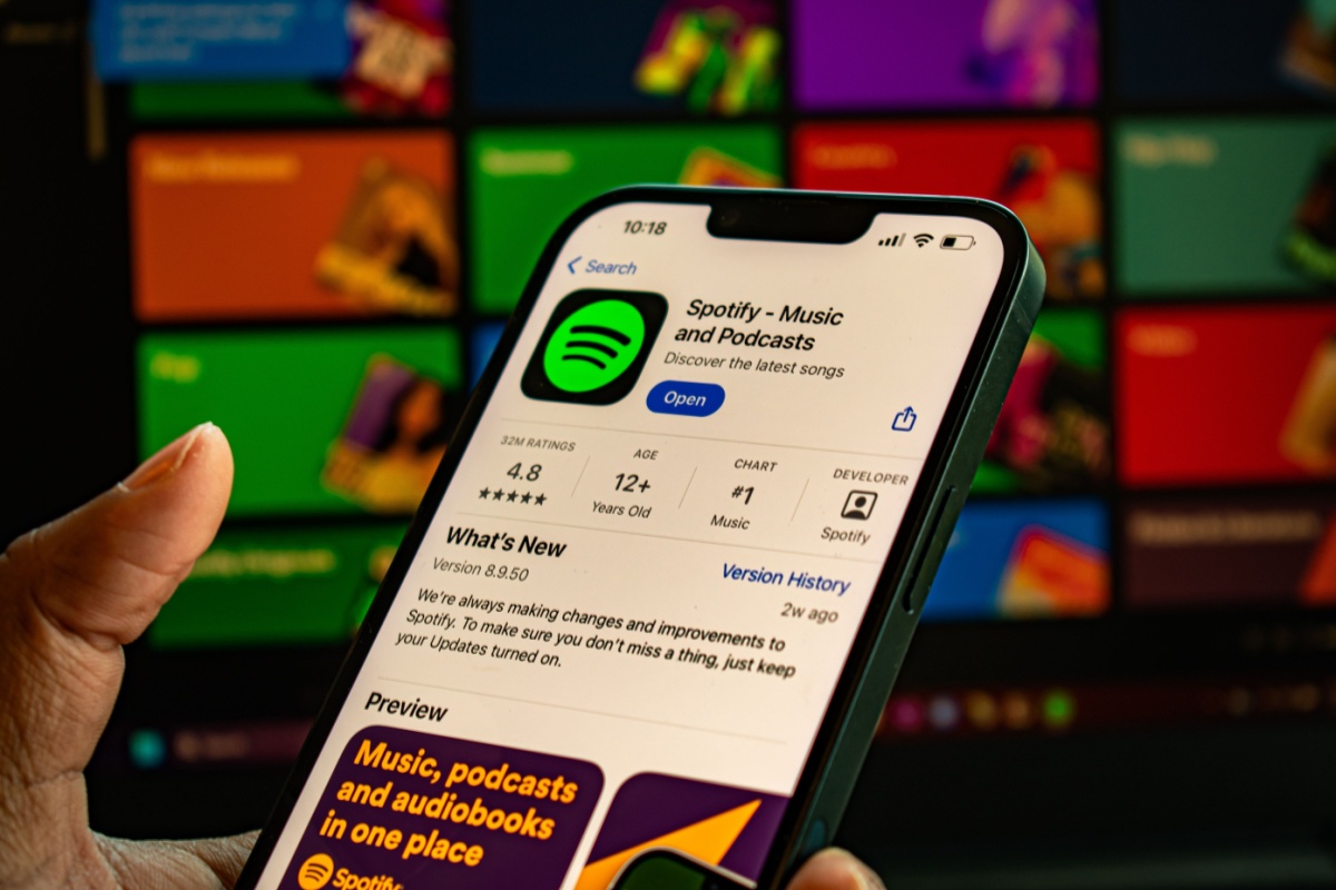 Spotify on iPhone. Photography by Charles-McClintock Wilson via Shutterstock