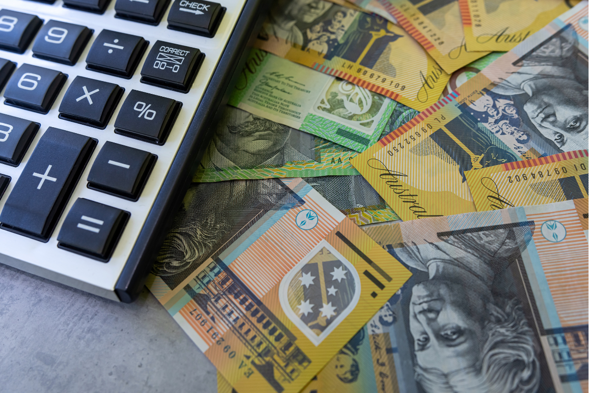 Australian dollars and calculator. Photography by RomanR via Shutterstock