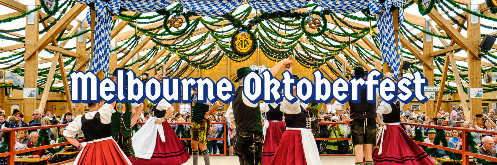 Dancing at Oktoberfest celebrations. Photography by FooTToo via Shutterstock.